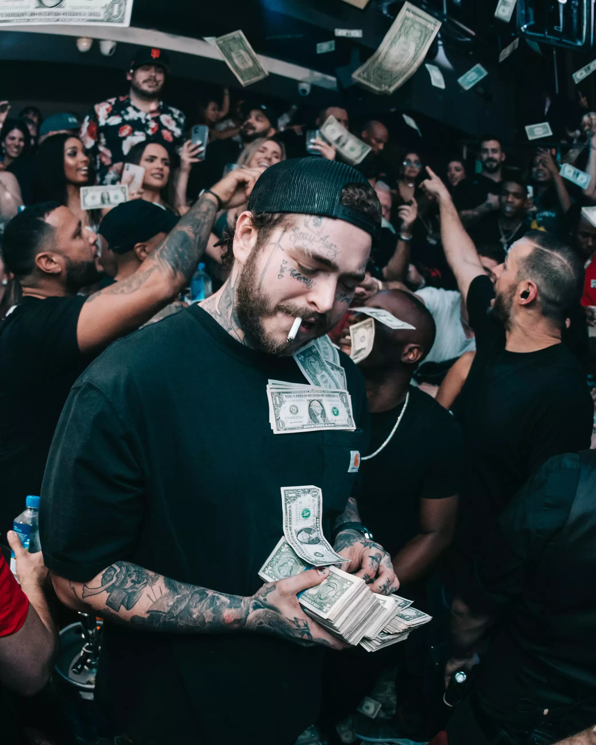Post Malone threw £40k into the crowd at his Miami gig.