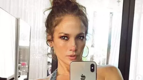 Jennifer Lopez Fans Confused About 'Guy In Mask' Spotted In Selfie