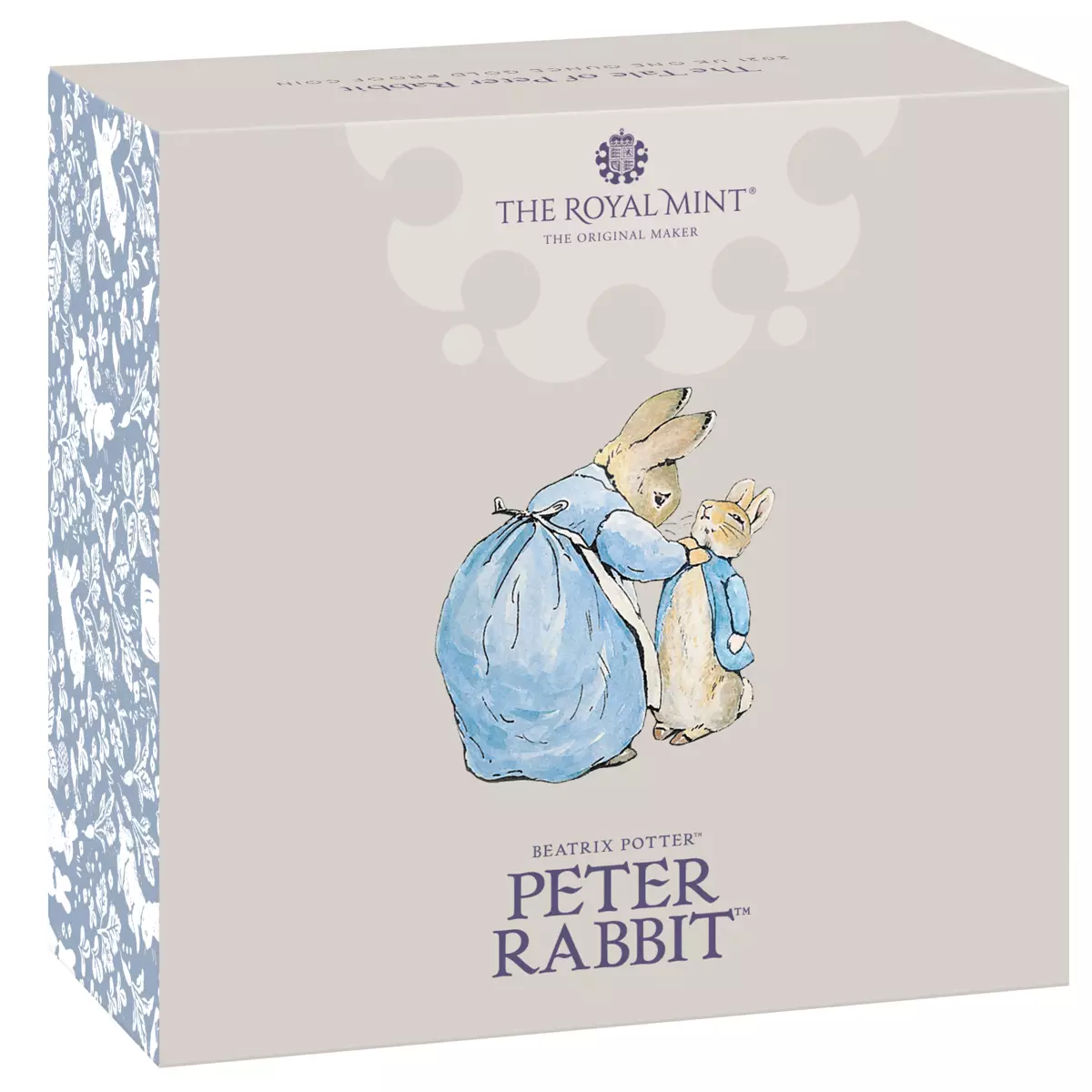 The coin features Peter Rabbit and the whole Rabbit family (