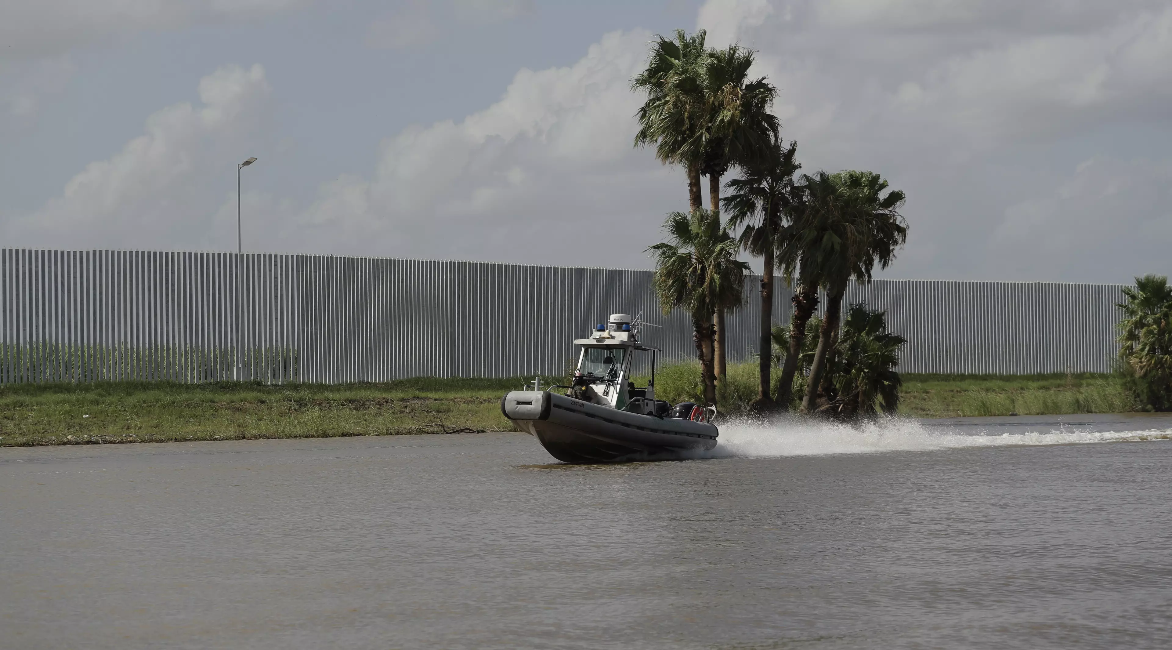 Tommy Fisher's border wall runs along the Rio Grande river near Mission, Texas.