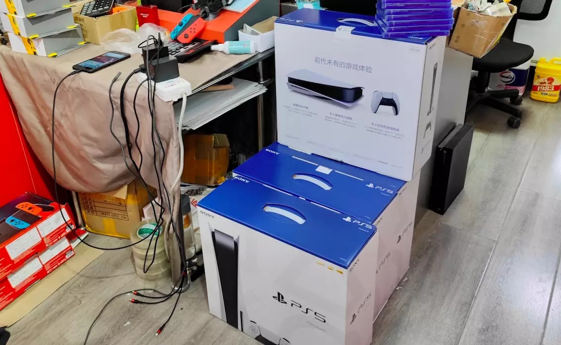 PlayStation 5 consoles stacked up at a store in the Gulou area in Beijing /