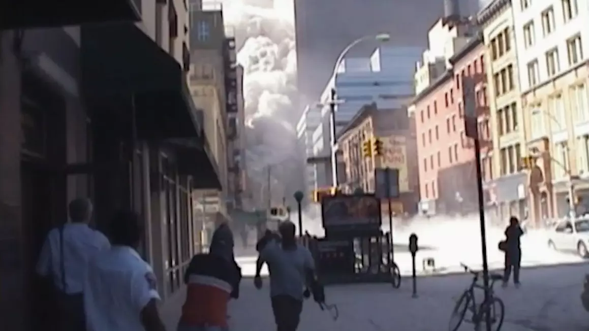 9/11 Footage Shows Moment Shop Owner Saved Woman From Wall Of Dust