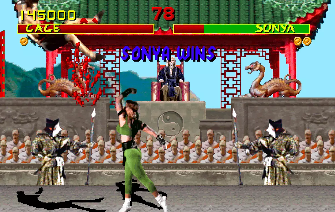 Sonya Blade finishes off Johnny Cage /