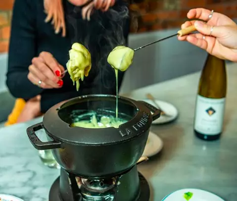You could make this oozy fondue yourself at home (