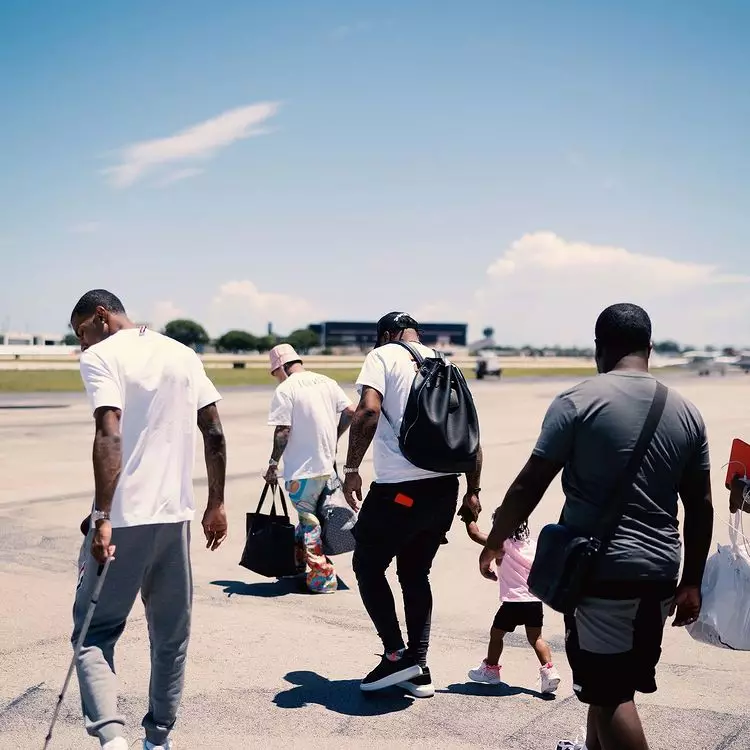 Davis shared pictures of him and his team boarding the plane.