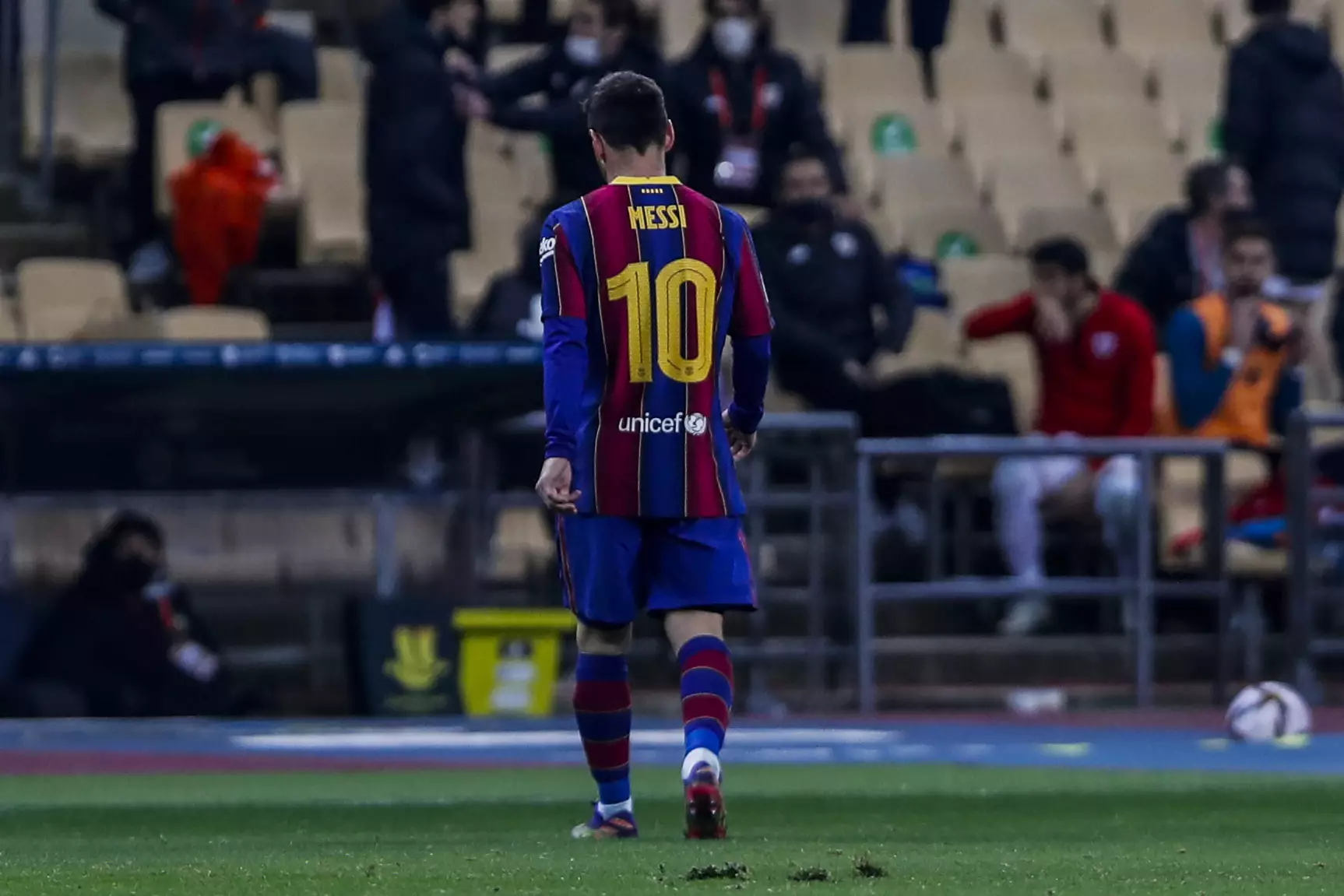 Messi walks off after getting sent off. Image: PA Images