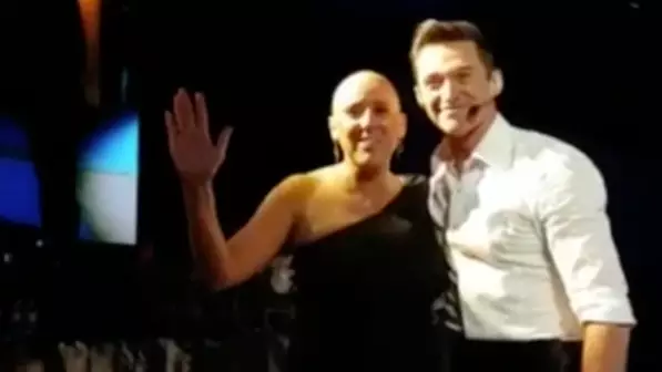Hugh Jackman Stops Show To Bring Woman With Cancer On Stage