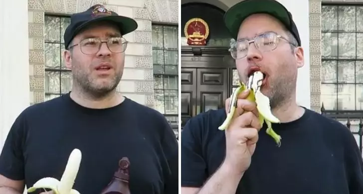 Prankster Eats Banana Seductively Outside Chinese Embassy To Protest Ban