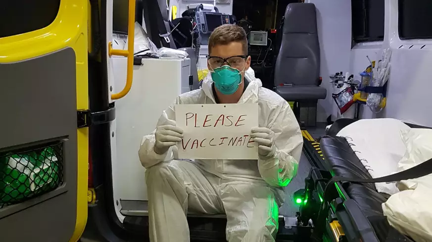 Paramedic Goes Viral For Confronting Picture Encouraging People To Get Vaccinated