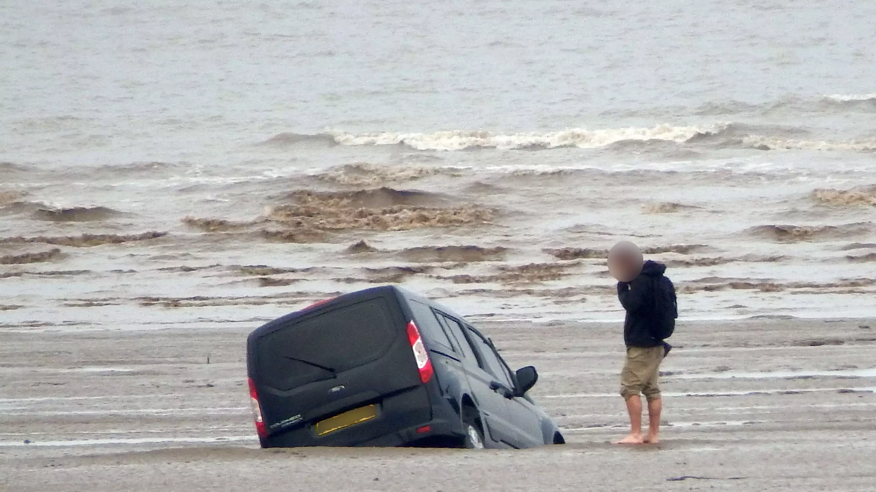 Man Helplessly Watches Van Sink Into Sea After Driving Onto Beach