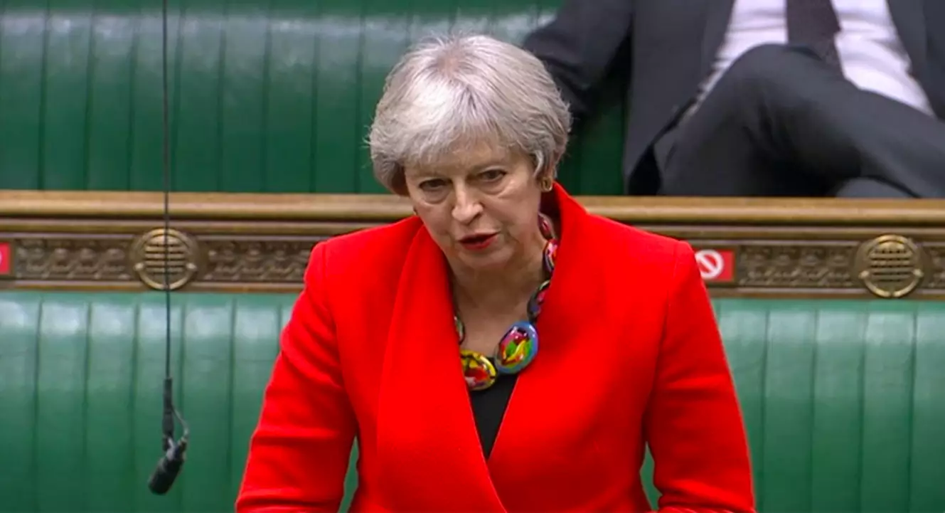 Theresa May's bright red coat looks familiar (