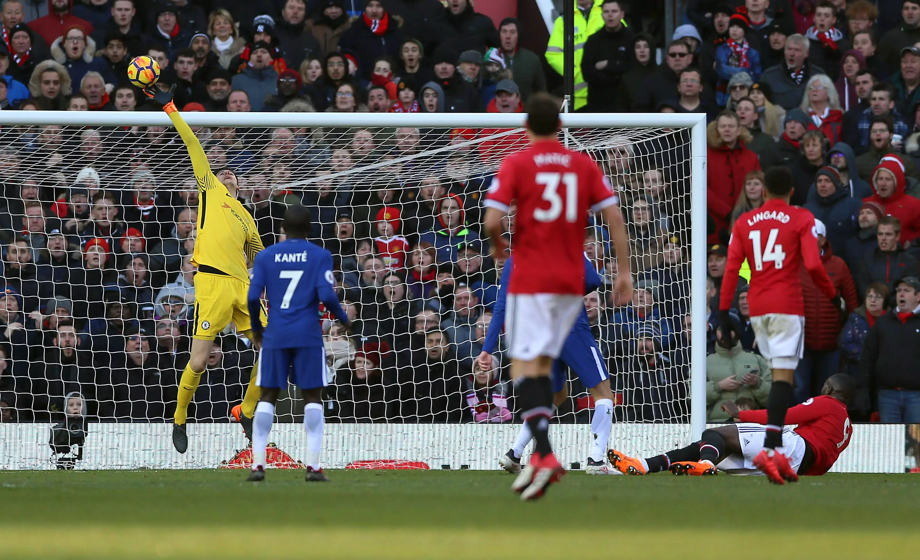Courtois in action. Image: PA