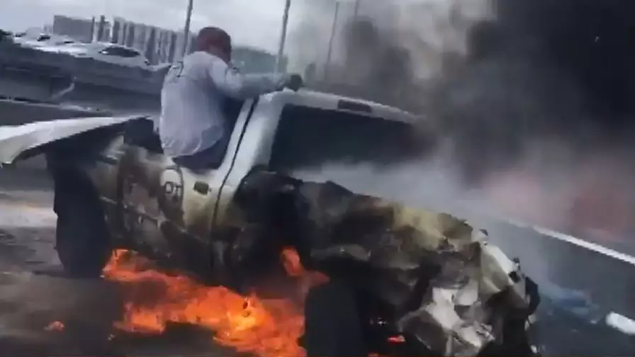 Shocking Video Shows Man Pulling Driver From Burning Car