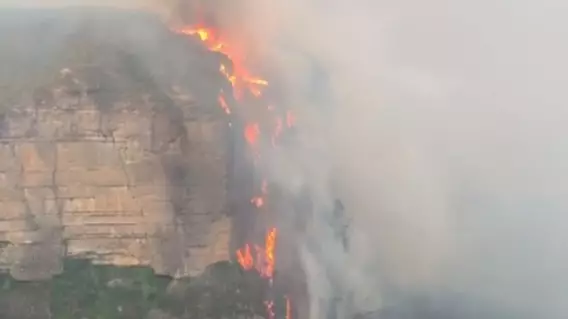 Fire Filmed Hugging Cliffside Like 'Lava Waterfall' In New South Wales