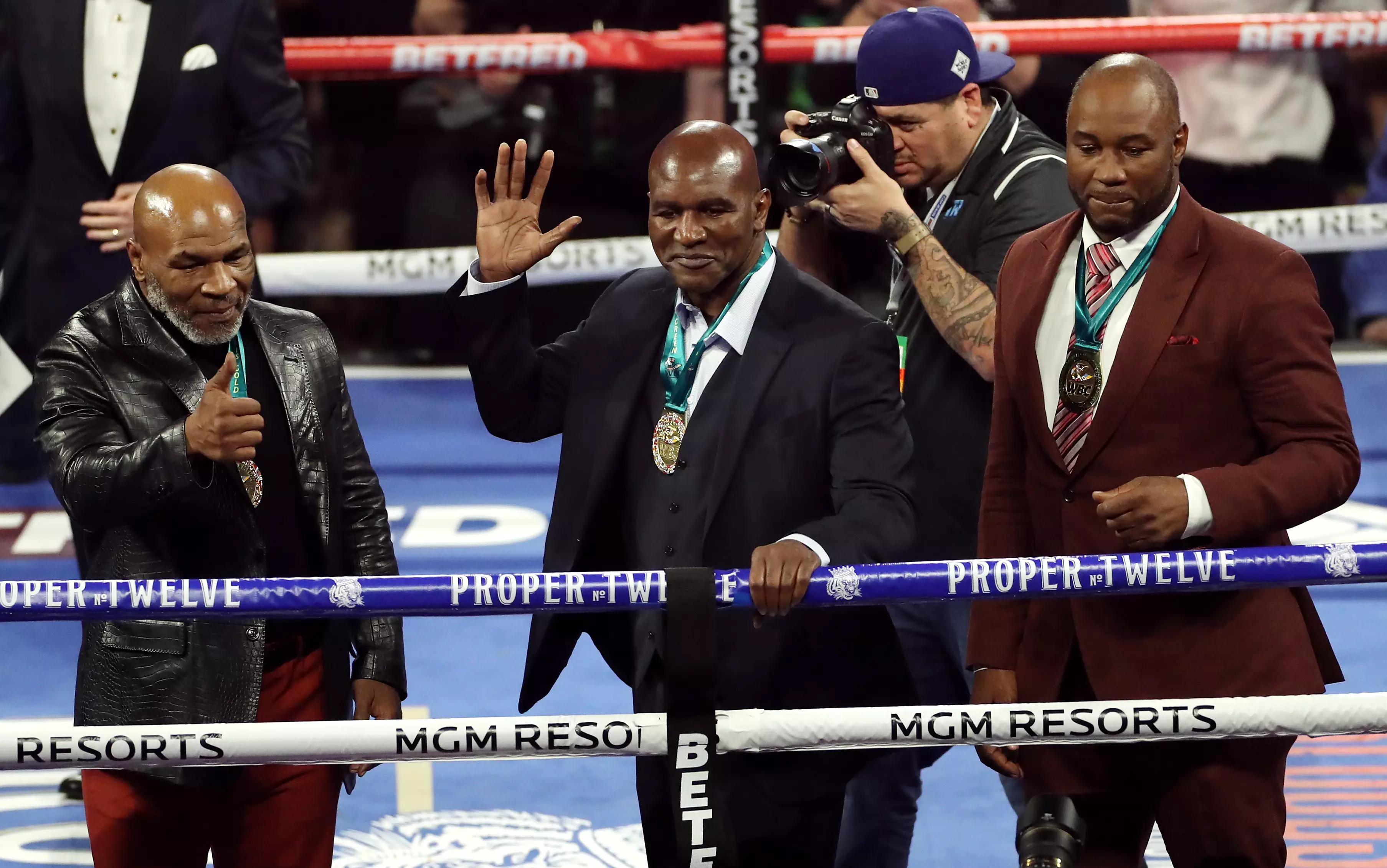 Tyson, Holyfield and Lennox Lewis in the ring ahead of Wilder vs Fury II. Image: PA Images