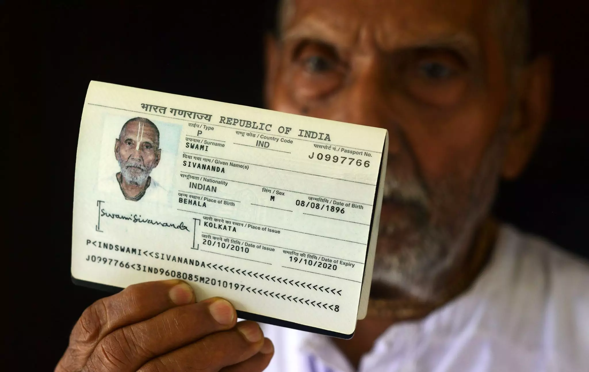 Swami Sivananda shocked airport staff when they saw the date of birth on his passport.