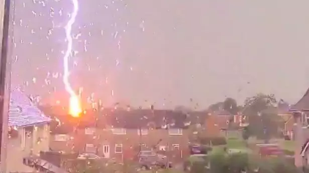 Terrified Woman Films Moment Lightning Strikes House In Middle Of Thunderstorm