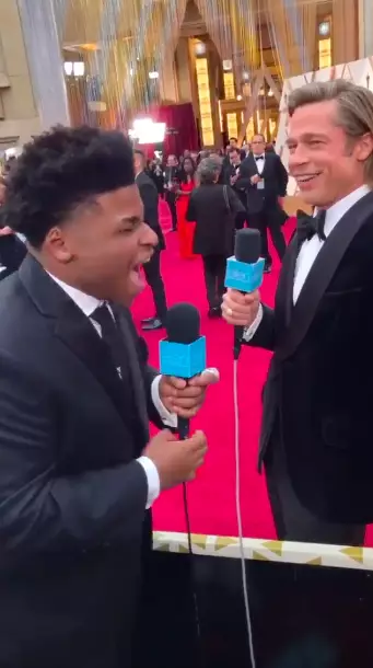 The 'Cheer' star was all laughs talking to Brad Pitt (
