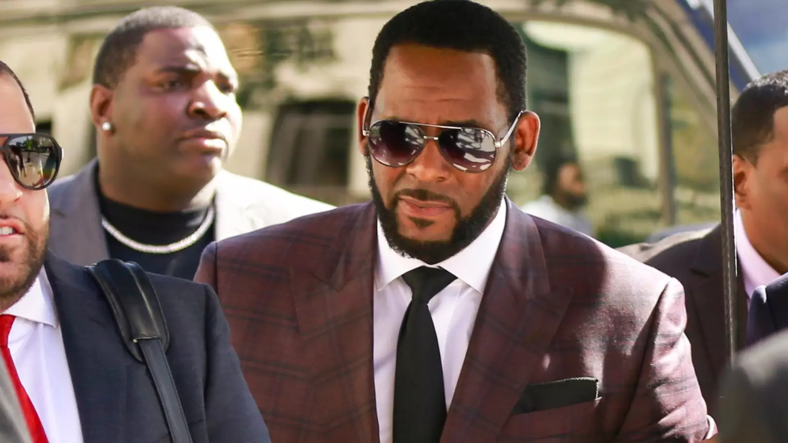 R. Kelly Charged With Two Counts Of Child Prostitution 