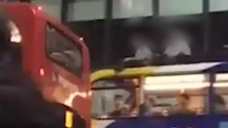 Two Boys Caught Riding On Top Of Double Decker Bus