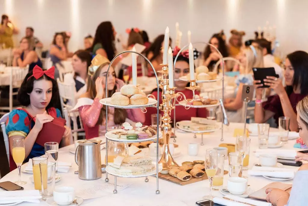 The high tea event encourages dressing up (