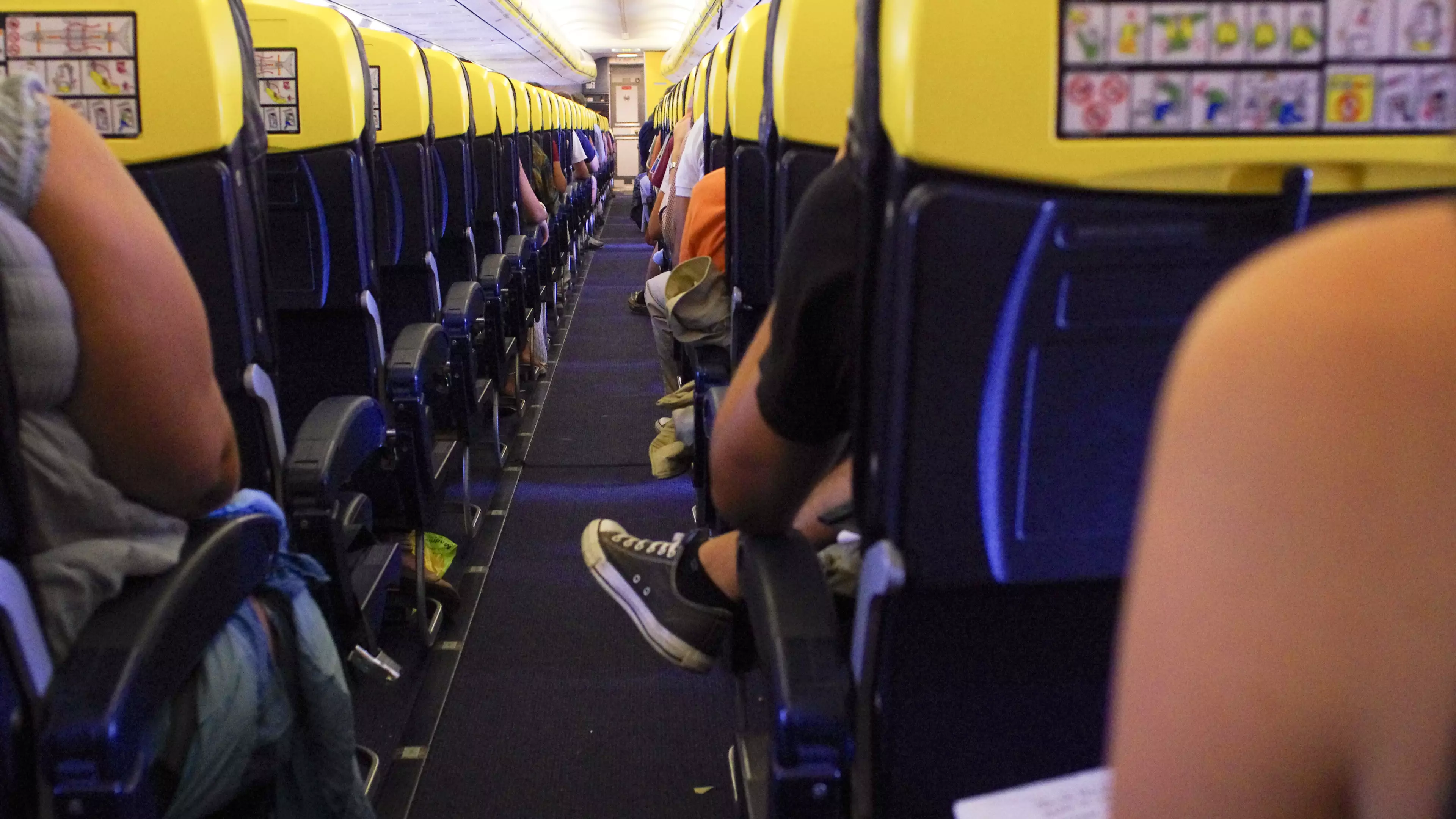 Ex-Flight Attendant Reveals Why You Should Never Take Your Shoes Off On A Plane