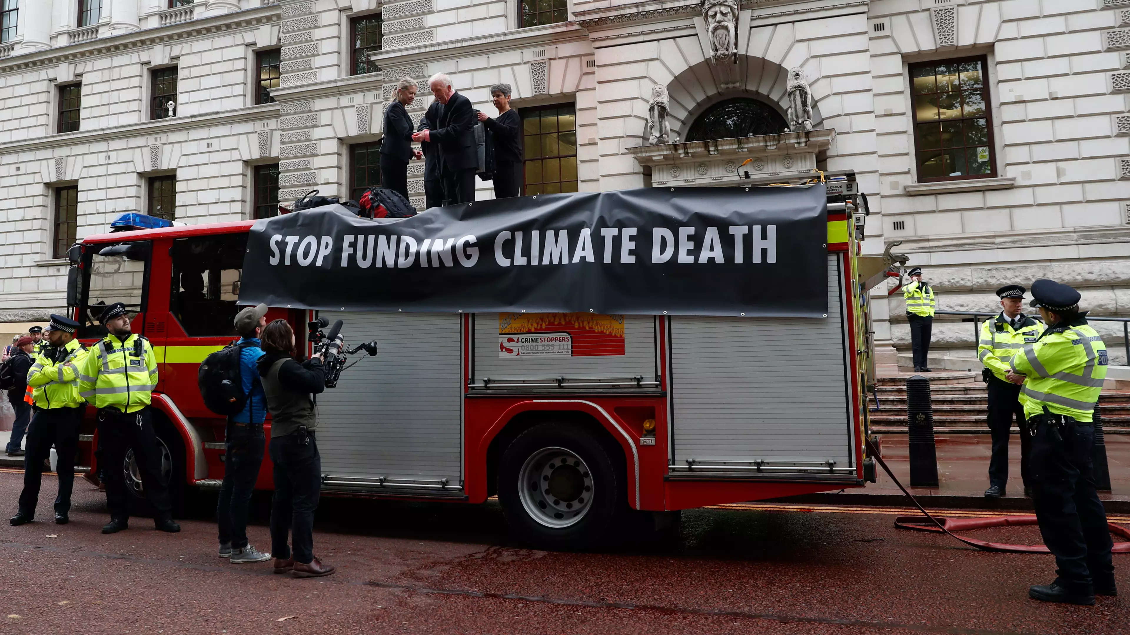 Extinction Rebellion Protesters Lose Control Of Fake Blood Hose