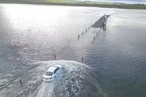 Uber Driver Races The Tide And Ends Up Stranded In Middle Of The Sea