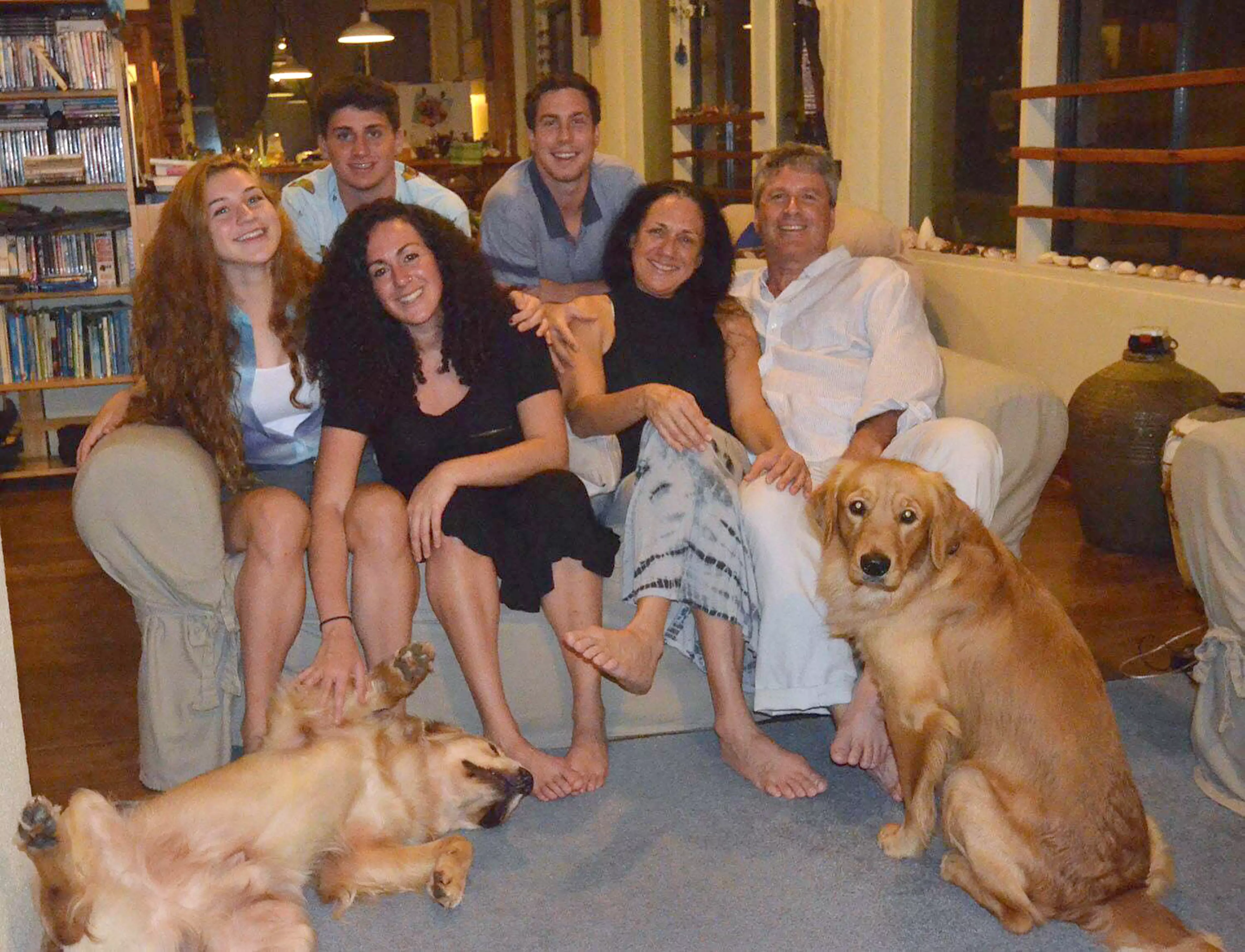 Pictured: Left to right - Gayle, Liam, Yarden, Chad, Tova and Navot with dogs Finn and Nemo.