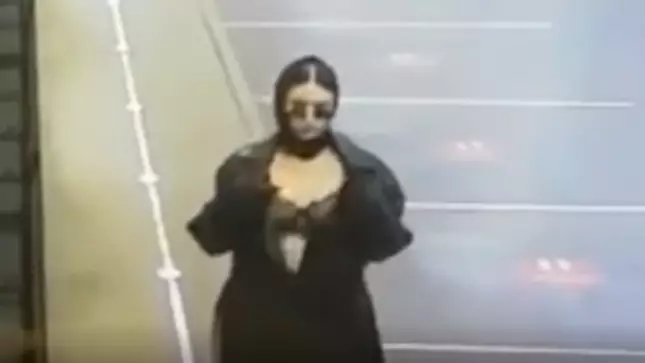 Mystery Woman Performs Mini Striptease For Tube Station CCTV Camera