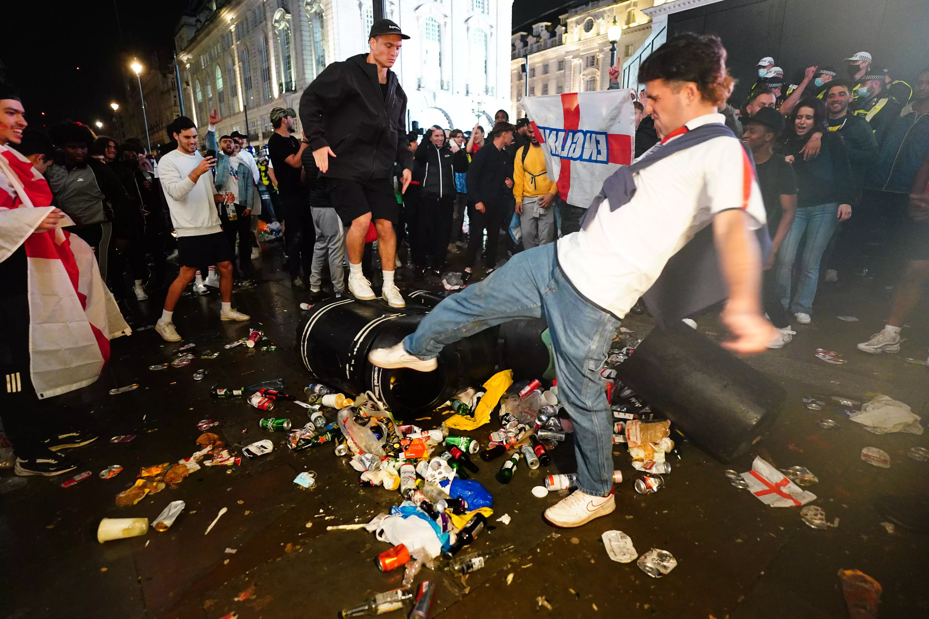 England fans taking their anger out on a bin after the final.